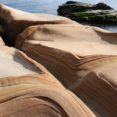 Intriguing rock surfaces beautifully shaped by waves over the ages